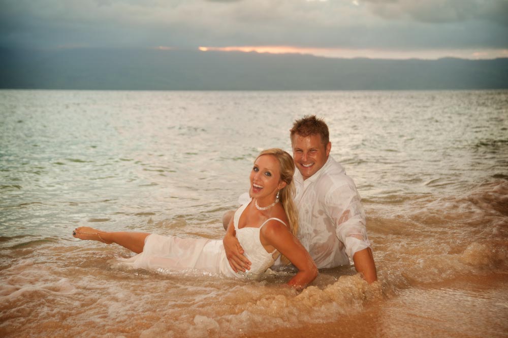 newly weds in the water, trash the dress